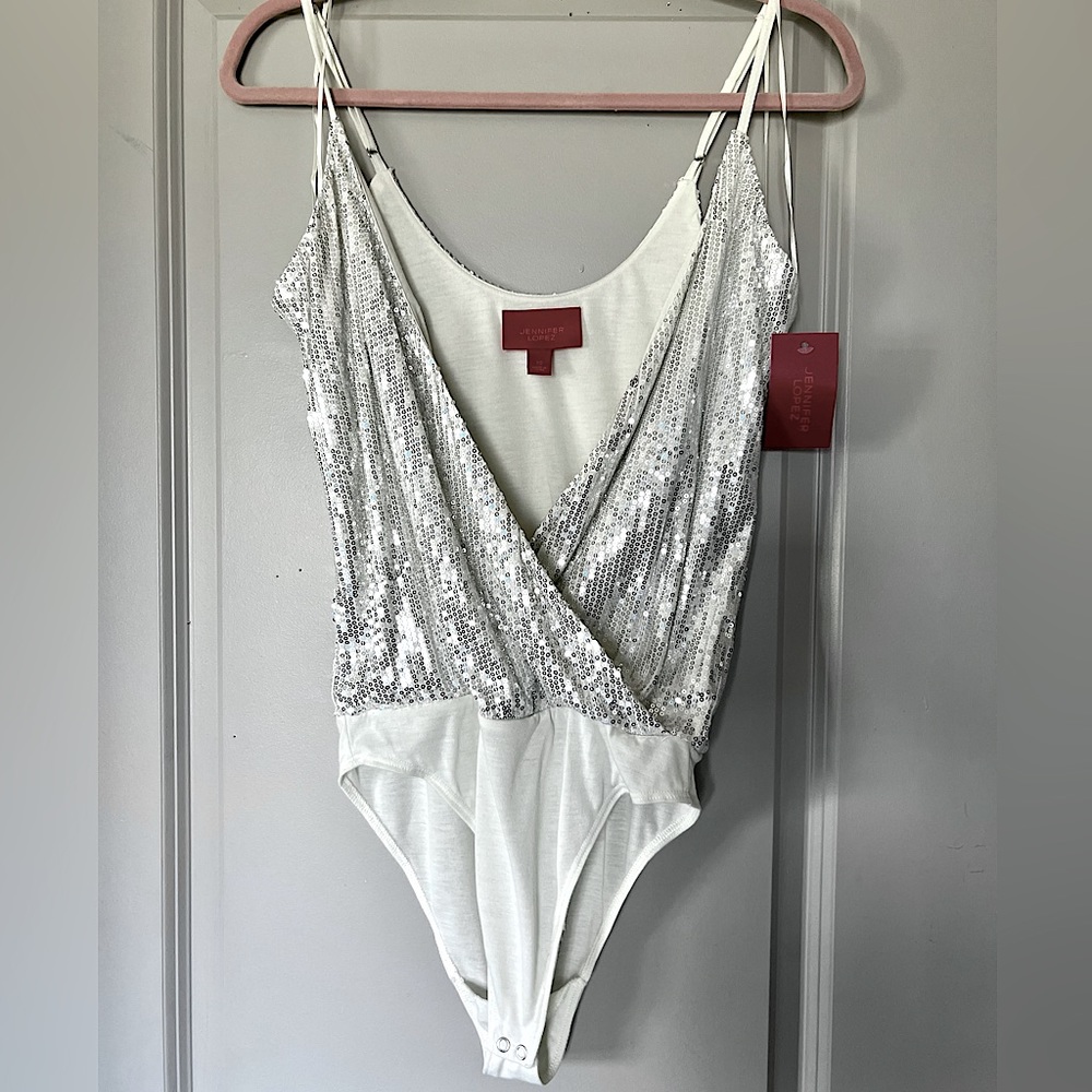 JENNIFER LOPEZ Sequin body suit. White with silver sequins. Size XS